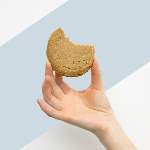A bite out of a Bellycrush weight management ginger flax cookie